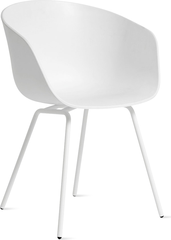 A front angle view of the AAC 26 About a Chair Armchair with a metal base.